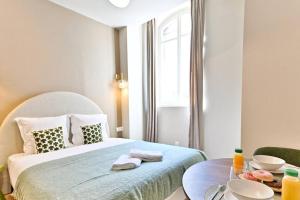 Appartements Petit studio plein pied aux portes de Paris : photos des chambres