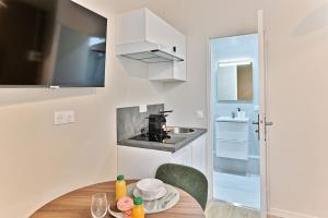 Appartements Petit studio plein pied aux portes de Paris : photos des chambres