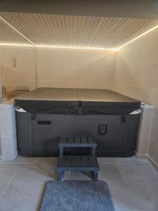 Appartements Appart design Jacuzzi Sauna, Salle de sports : photos des chambres