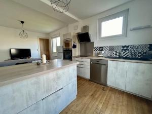 Appartements Maison 4 couchages : photos des chambres