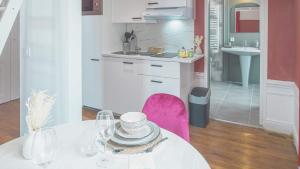 Appartements BonAppart 14 - Charme Napoleonien & Confort : photos des chambres