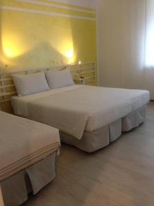 Basic Dreibettzimmer mit Gemeinschaftsbad