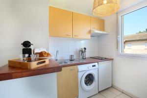 Appartements Berges du Midi - Piscine Parking : photos des chambres