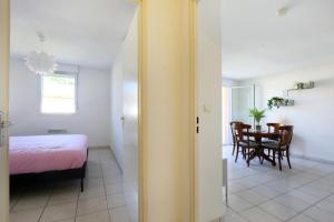 Appartements Berges du Midi - Piscine Parking : photos des chambres