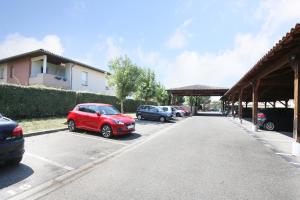 Appartements Berges du Midi - Piscine Parking : photos des chambres