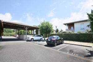 Appartements Berges du Midi - Piscine Parking : photos des chambres