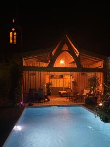 Maisons d'hotes Chalet Atypique VUE Piscine Chauffee : photos des chambres