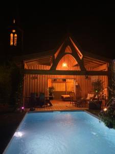 Maisons d'hotes Chalet Atypique VUE Piscine Chauffee : photos des chambres