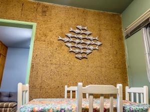 R6 · Uma obra de arte na sua praia