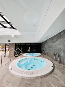 Green Port Pink&Blue 204 Kołobrzeg Podczele strefa basenowa, sala zabaw