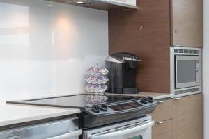 Sleek Kitchen Island And Garden Views