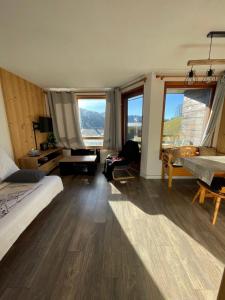 Appartements Studio cabine cosy a 5min a pieds des pistes et du centre ville : photos des chambres
