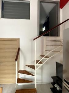 Comfy apartment with low ceiling attic