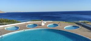 Beachfront Villa Atalandia with Heated Pools, Gym, BBQ & Office