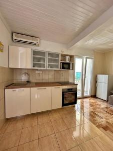 Apartmani Tri Palme