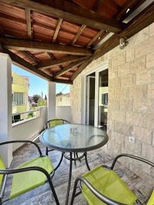Apartmani Tri Palme