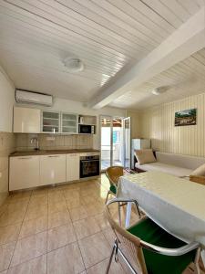Apartmani Tri Palme