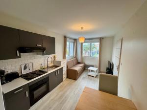 Appartements Domaine des 5 Roses - Rose Blanche : photos des chambres