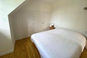Maisons de vacances Maison avec jardin proche du centre et des plages : photos des chambres