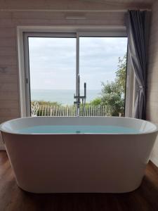 Lodges La Bayeuzen - La Mer : photos des chambres