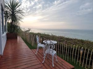 Lodges La Bayeuzen - La Mer : photos des chambres