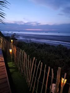 Lodges La Bayeuzen - La Mer : photos des chambres