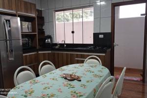 Casa Confortável arejada ar condicionado quente e frio 2 quartos ,2 banheiros ,2 vagas de garagem