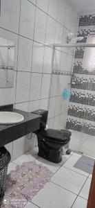 Casa Confortável arejada ar condicionado quente e frio 2 quartos ,2 banheiros ,2 vagas de garagem