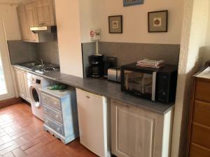 Appartements Magalas Top Apartment : photos des chambres