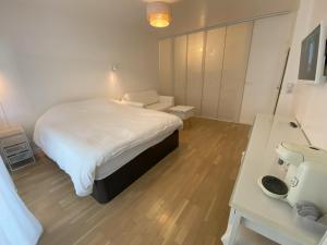 Grande chambre avec cuisine privée