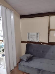 Kitnet aconchegante com estacionamento