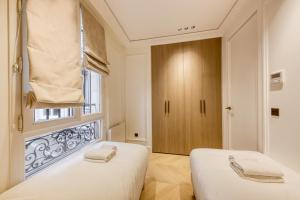 Appartements Prestige l 3CH l 2SDB l Clim l Louvre : photos des chambres