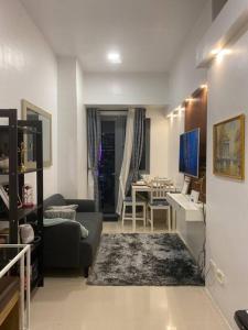 1BR CONDO Fame Residences Mandaluyong- Be My Guest Staycation- Near SM Megamall, Greenfield District, & Ortigas - Объекты без категории в городе Манила