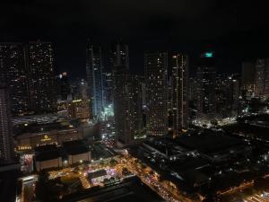 1BR CONDO Fame Residences Mandaluyong- Be My Guest Staycation- Near SM Megamall, Greenfield District, & Ortigas