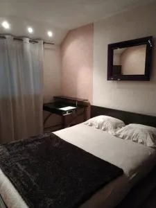 Chambre Grand lit Afrik - Льєсен