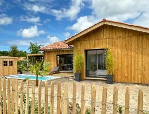 Maison en bois avec piscine proche de la plage - Miqueou