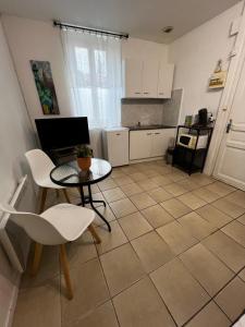 Appartements Beau studio : photos des chambres