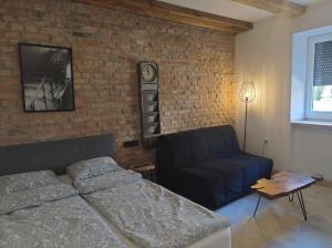 Motyl Apartamenty Studio lub pokój z łazienką