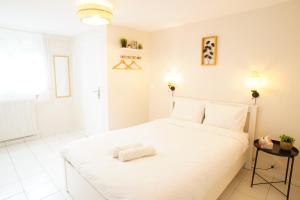 Appartements Villa Petite Fleur proche Paris CDG Disney Asterix et Parc des Expos : photos des chambres