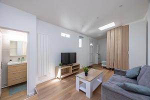 Appartements Studio Cosy Terrasse au Calme CDG Disney : photos des chambres
