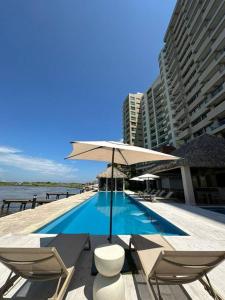 Departamento acogedor con vista al mar y alberca