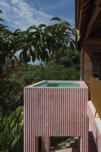 Kado Kubu Modern Tropical 2BR Pink Villa with Sky Pool with Ocean Views in Uluwatu