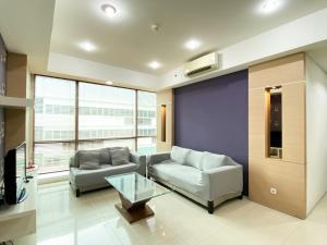 Modern Look and Comfort 2BR Kemang Village Apartment By Travelio