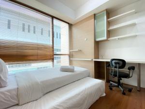 Modern Look and Comfort 2BR Kemang Village Apartment By Travelio