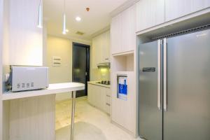 Comfort Stay 2BR with Private Lift at Masterpiece Apartment By Travelio