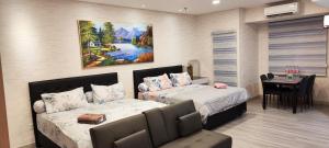 Spacious 2 King Bed Family Room 56 Sqm PODOMORO APARTMENT Tower Liberty 21st Floor with Mall Direct Access