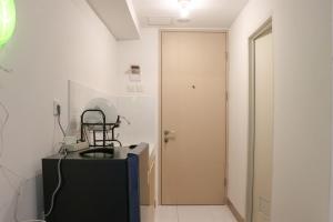 Comfy and Simply Studio Tokyo Riverside PIK 2 Apartment By Travelio