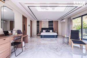 StayVista at Grande Prima - Pool, Theatre Room & BBQ