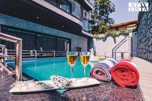 StayVista at Grande Prima - Pool, Theatre Room & BBQ