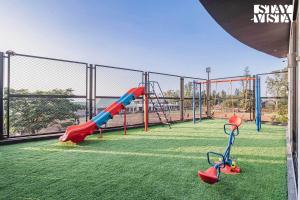 StayVista at Grande Prima - Pool, Theatre Room & BBQ